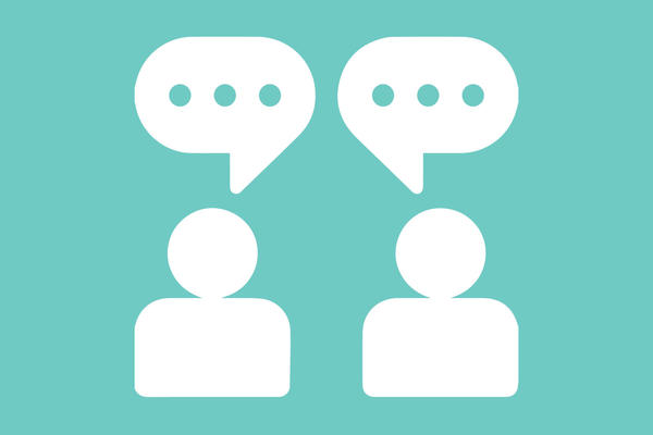 Two people talking