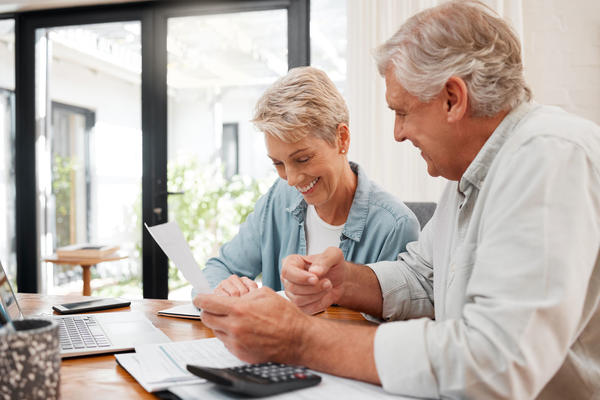 Retired People Looking at Computer